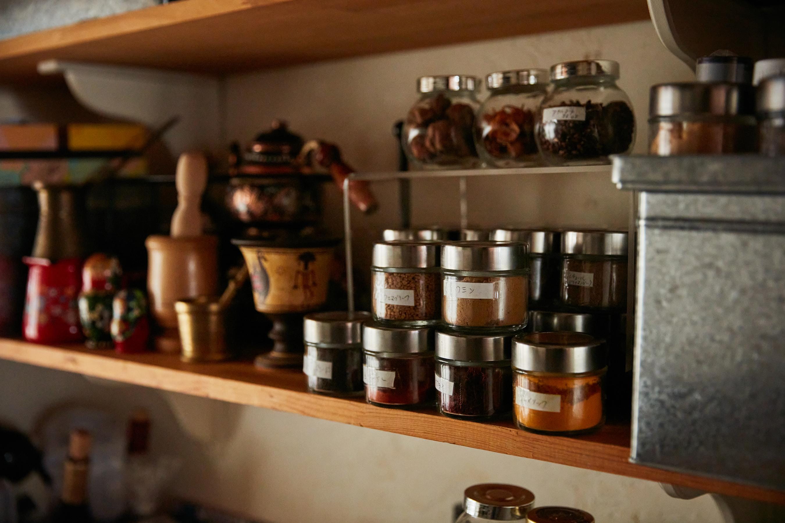 The spice shelf in Yurico Aoki's kitchen studio displays her collection from around the world