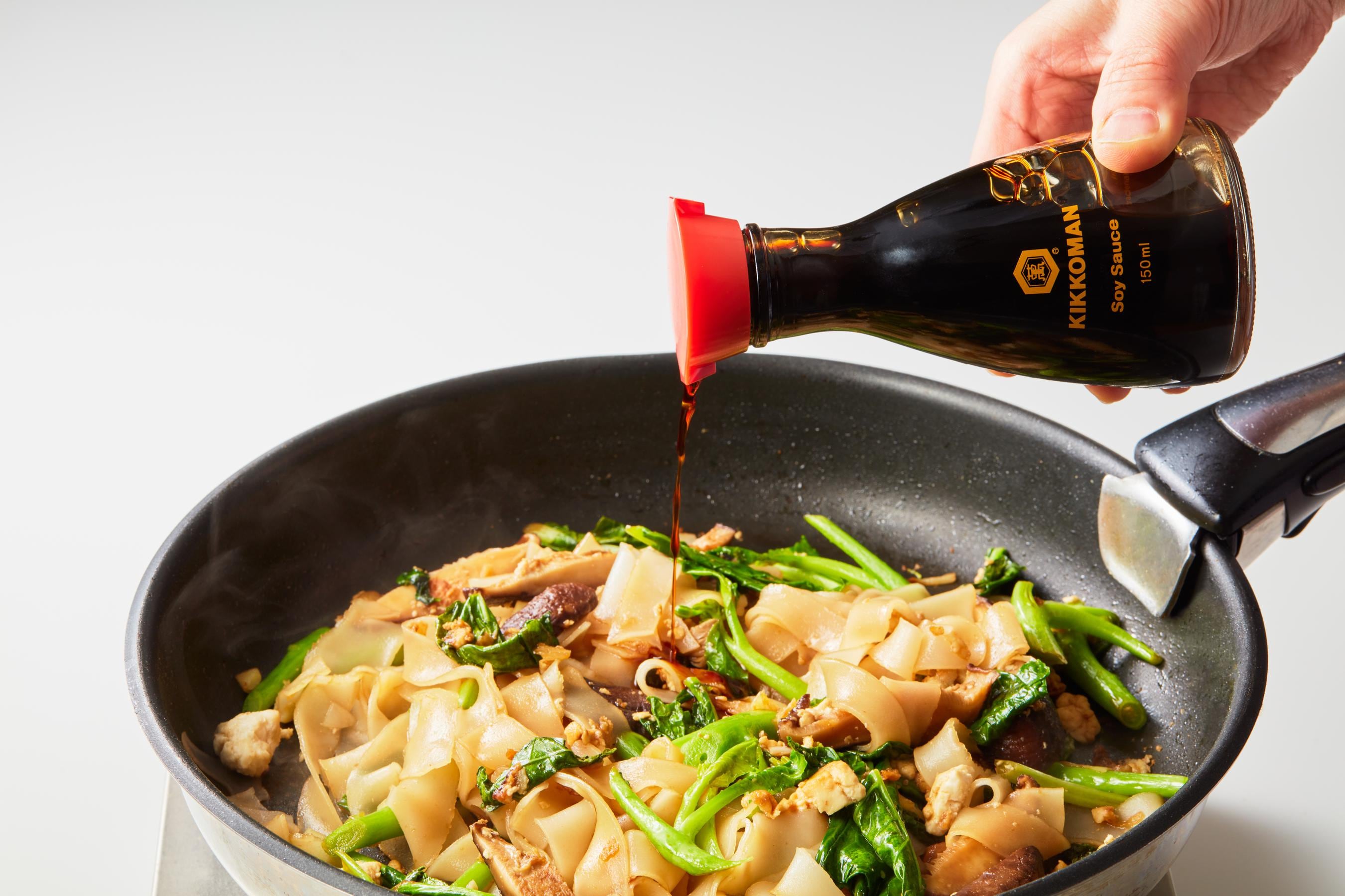 Season the dish with Kikkoman Soy Sauce if needed