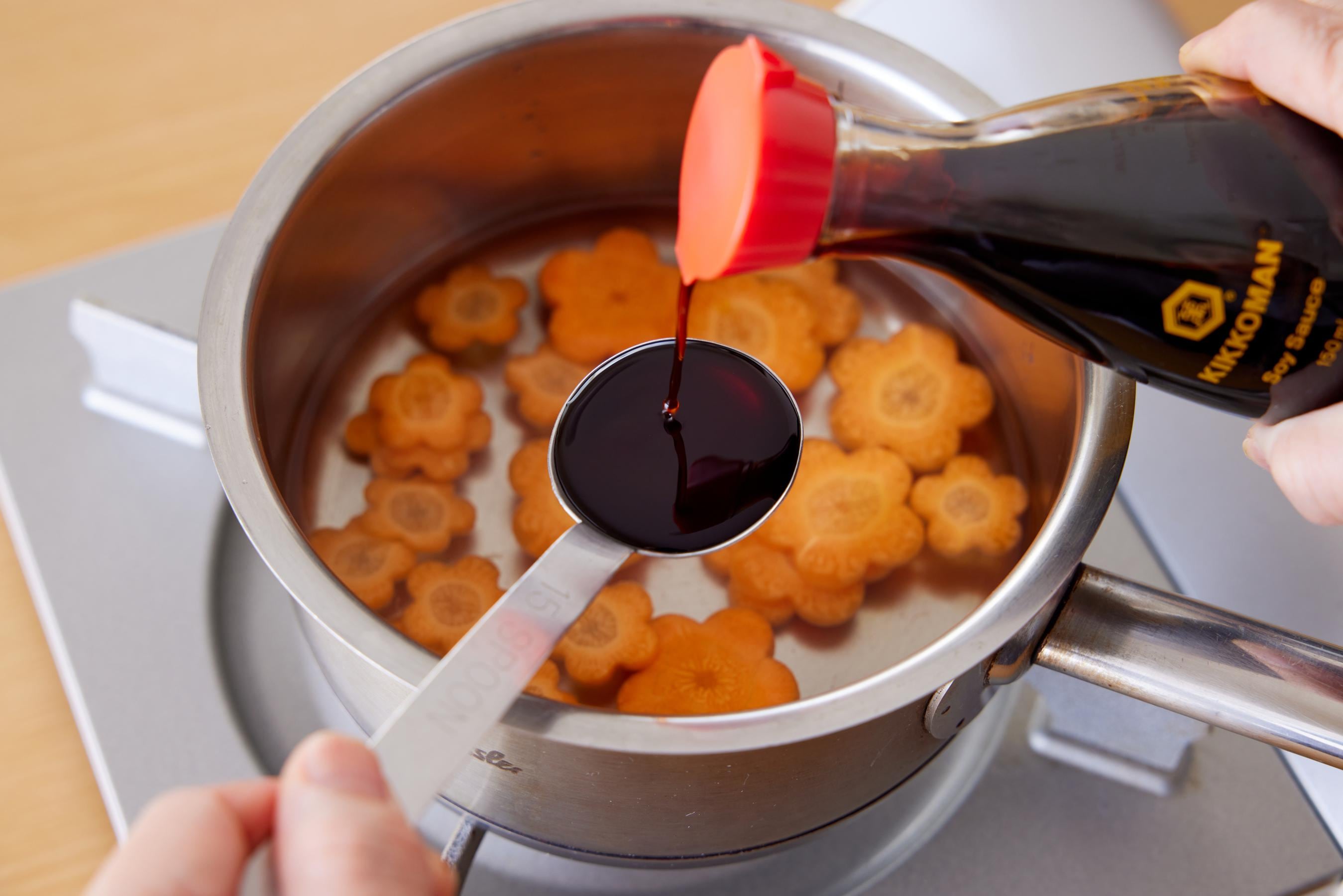 Pouring Kikkoman Soy Sauce