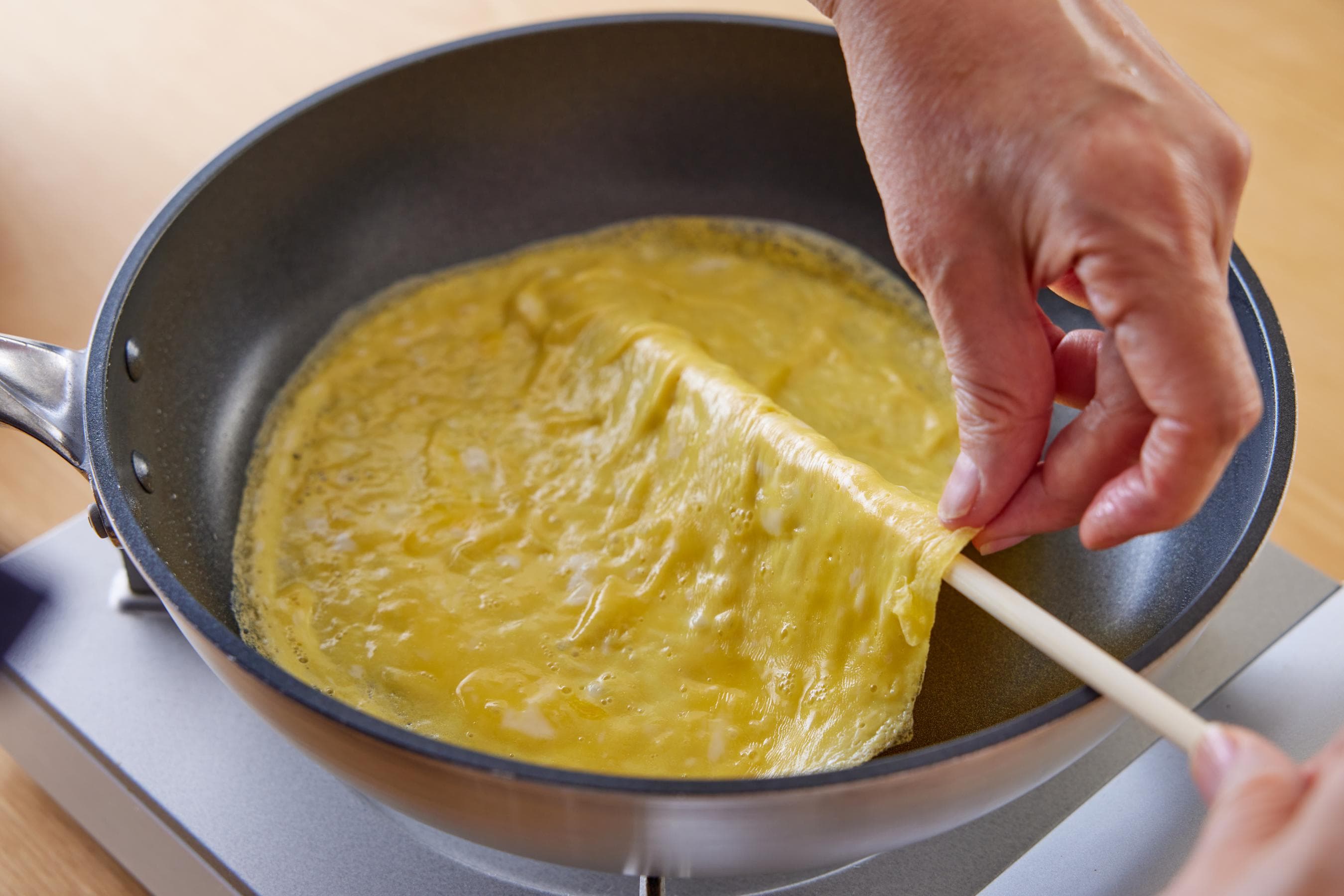 flipping over the fried egg