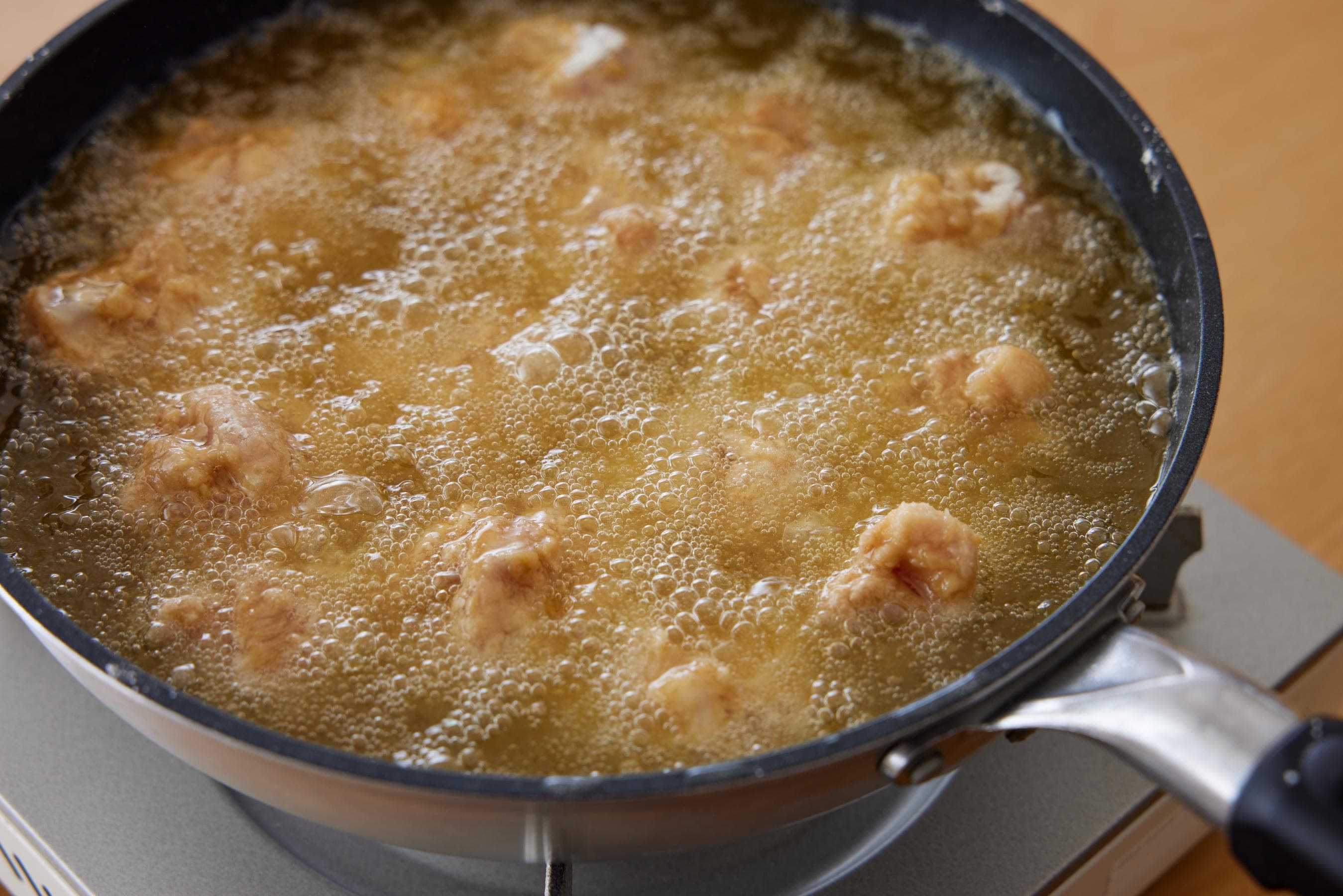 deep-frying the chicken