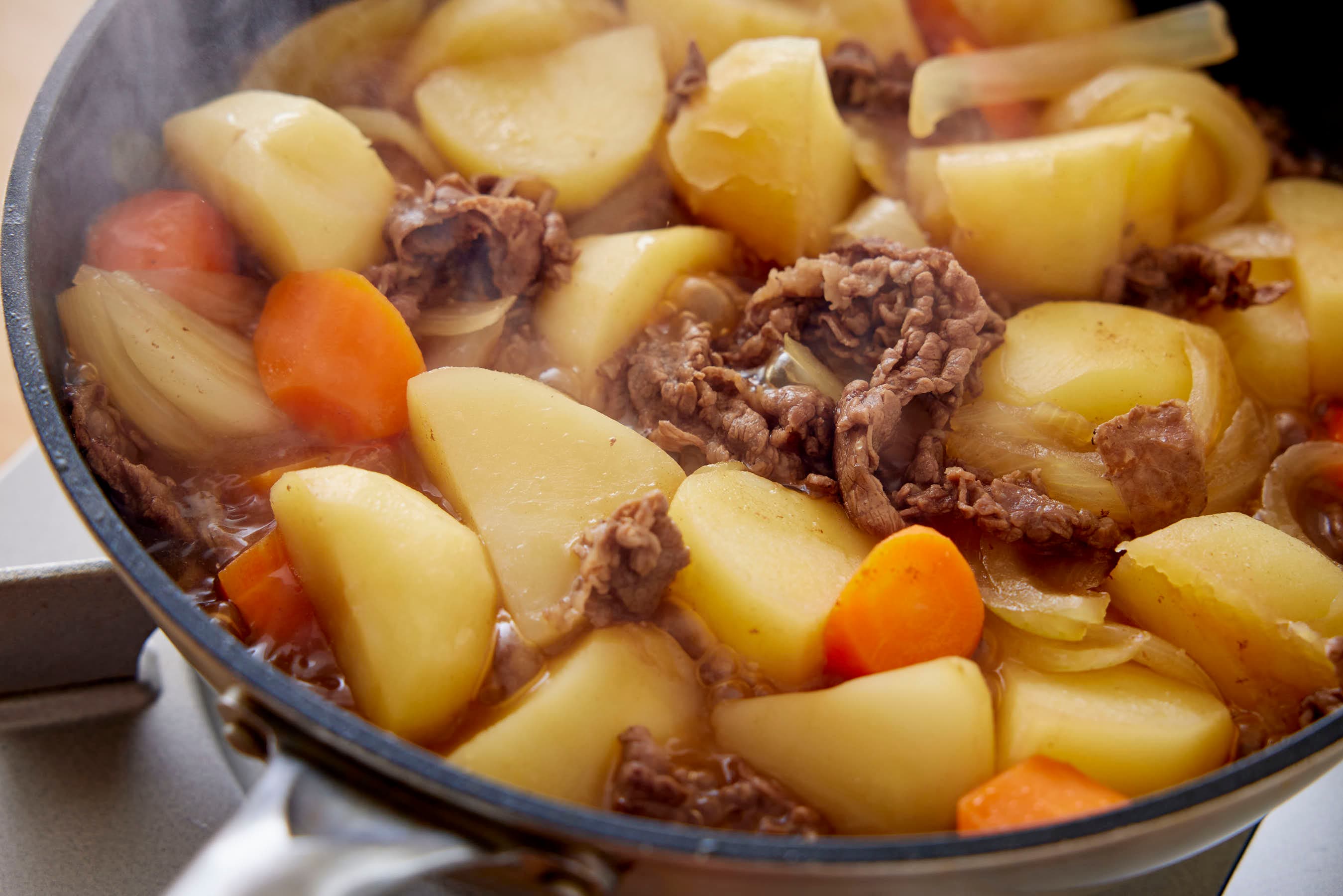 Simmering nikujaga in a pan
