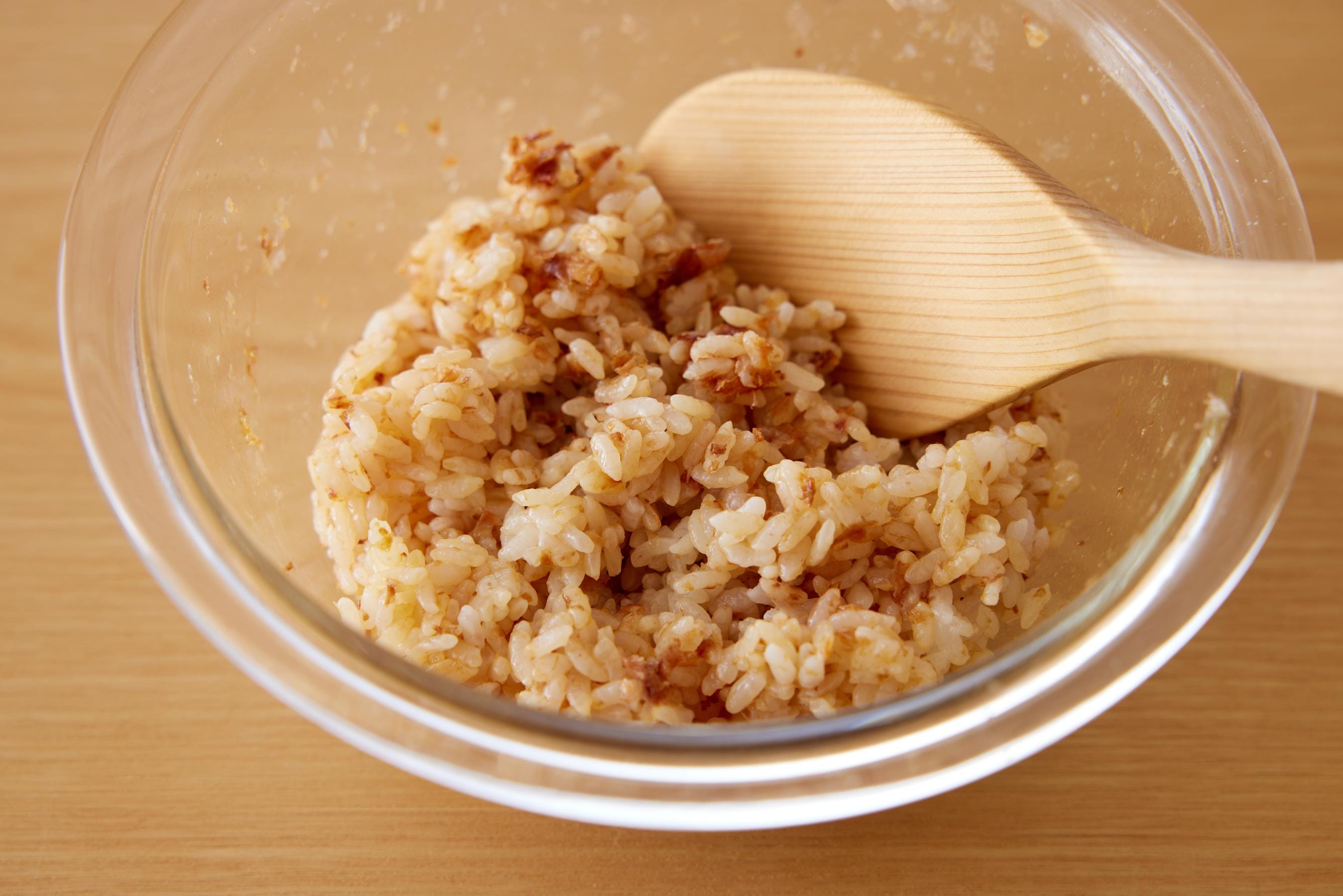 mixing the ingredients of bonito soy sauce rice