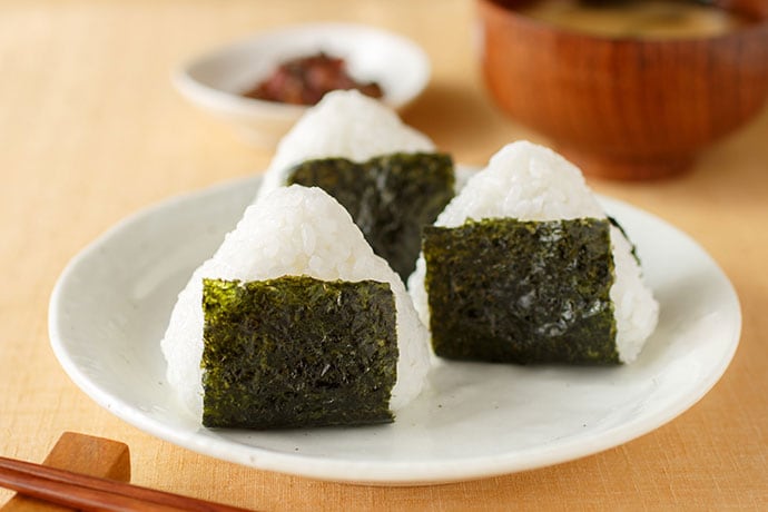 Triangular onigiri wrapped in nori seaweed