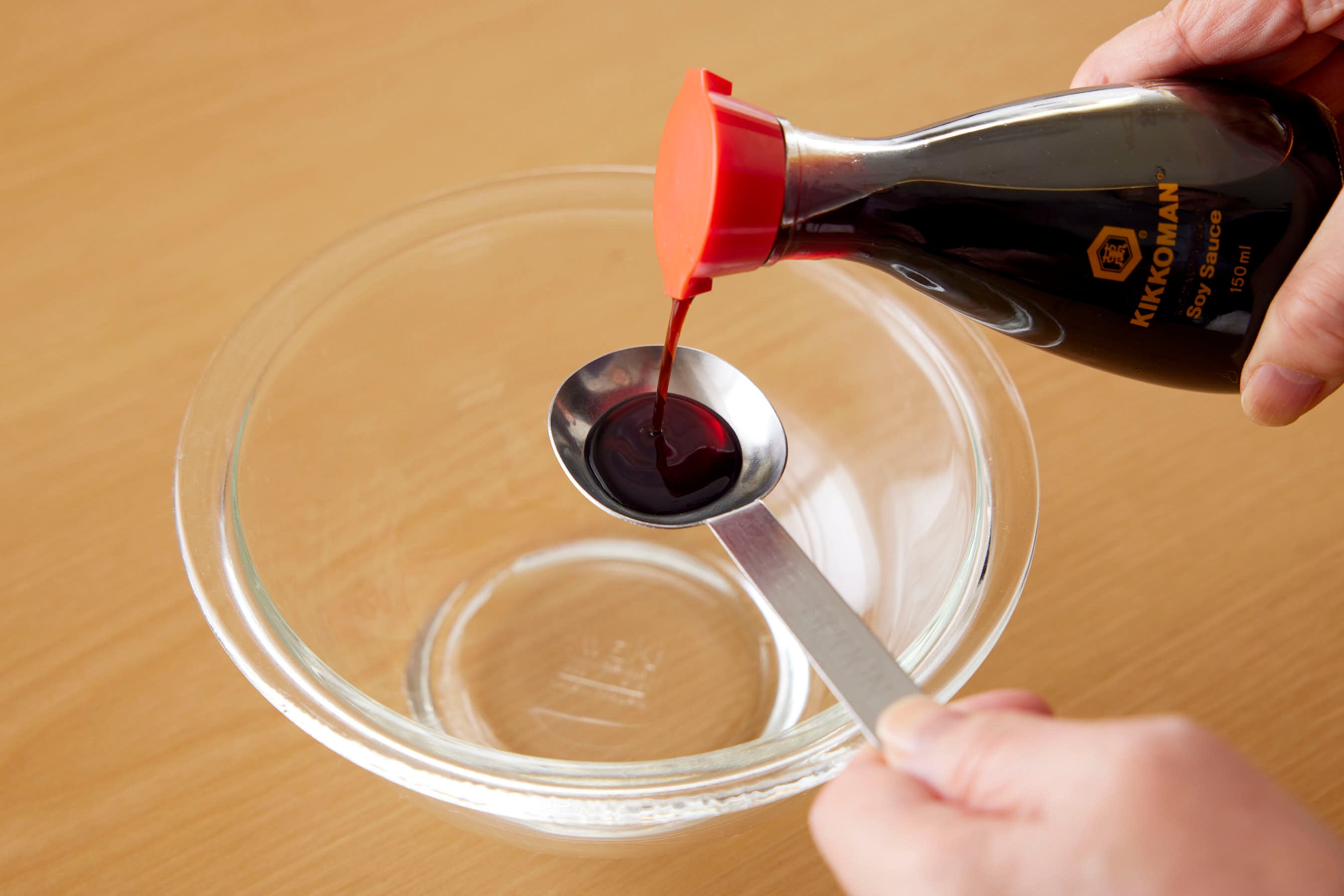Adding soy sauce into water