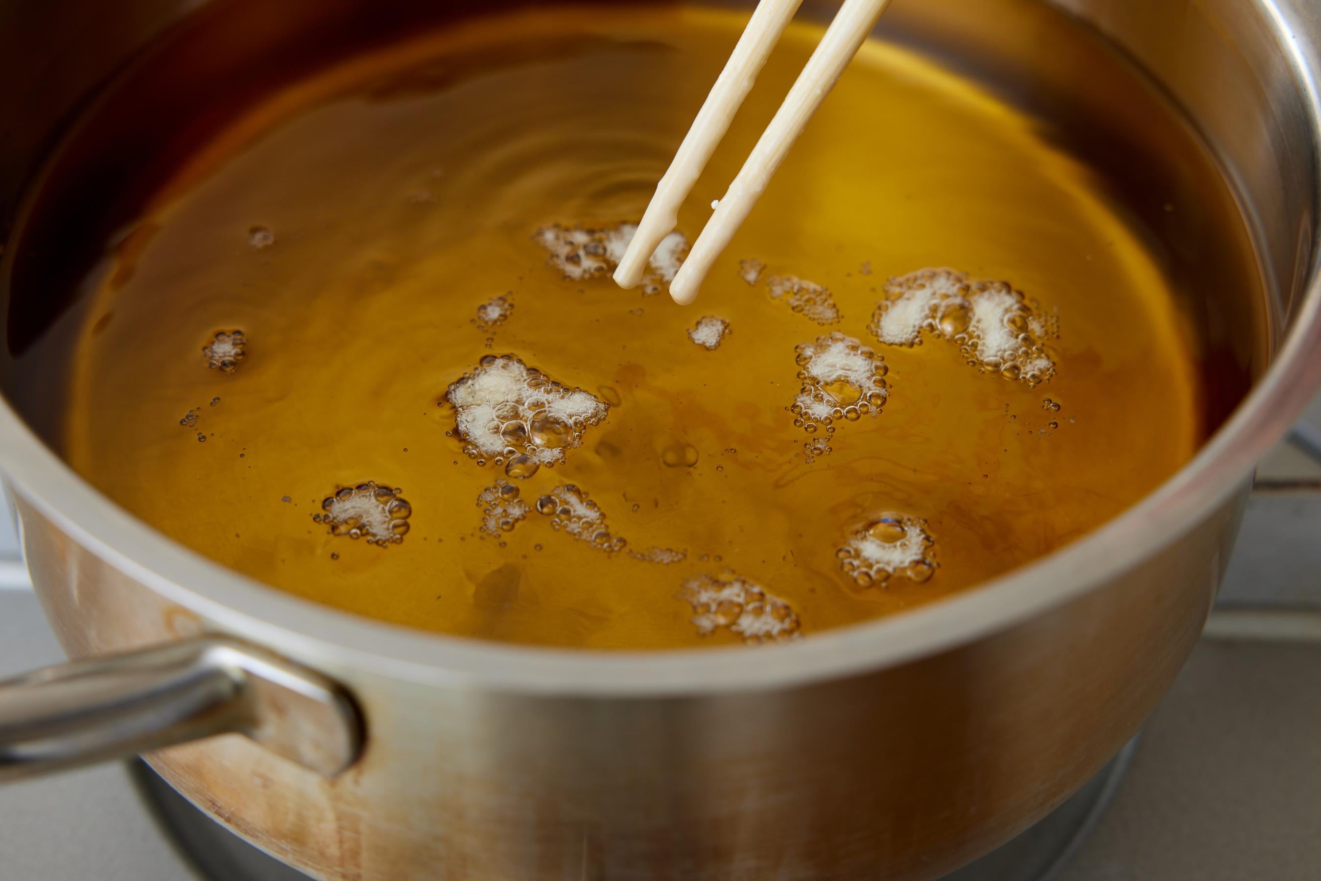 Heating cooking oil.